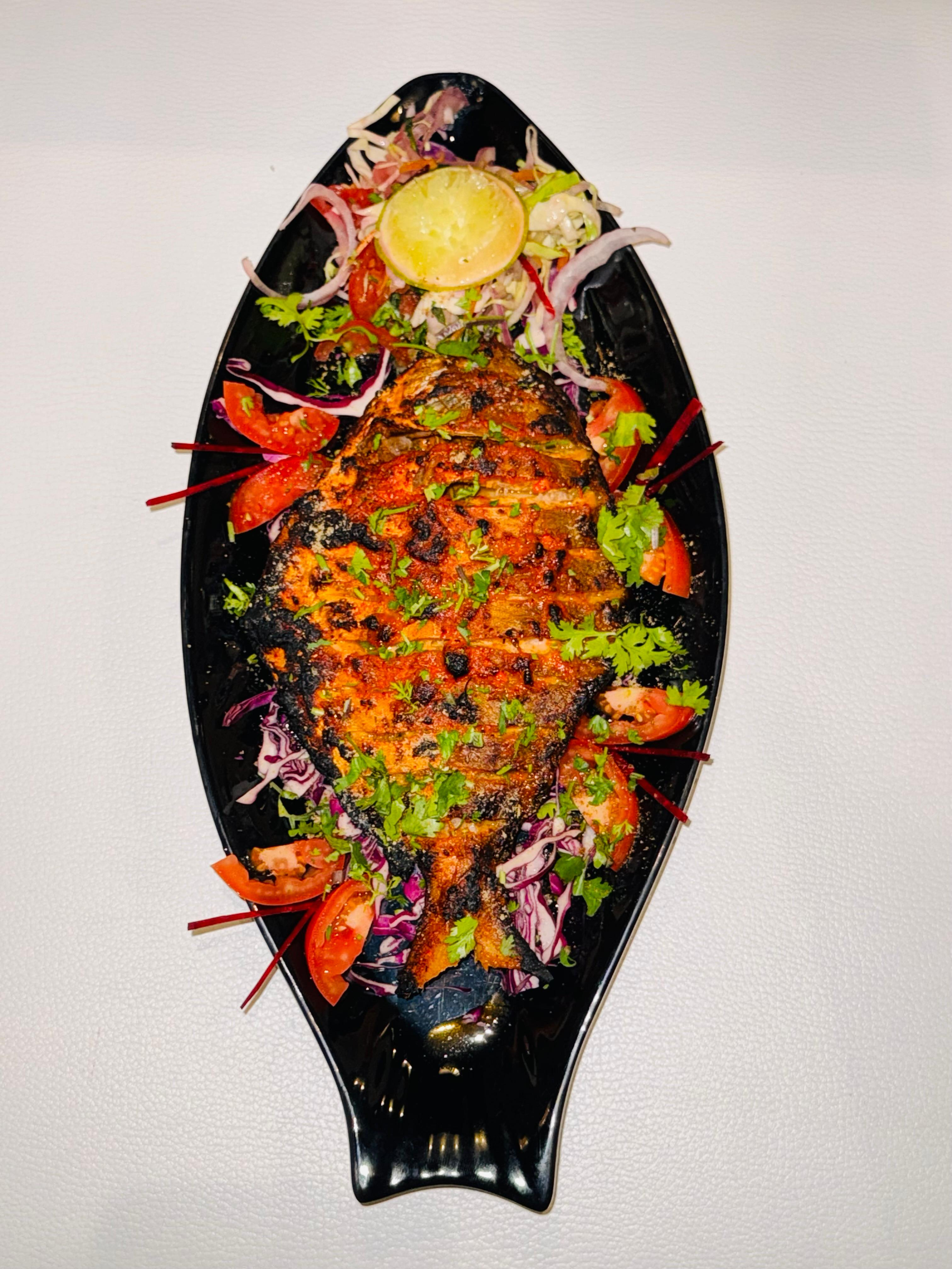 Colorful tandoori fish platter